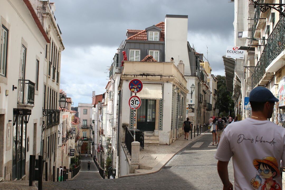 people on hillside streets